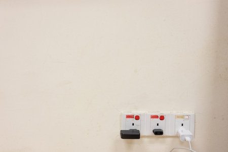 closeup shot of socket plug on the wallの写真素材
