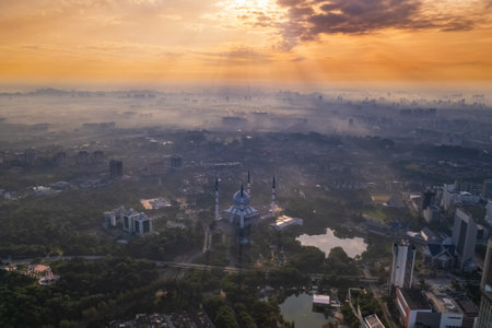 aerial view of beautiful scenery Sultan Salahuddin Abdul Aziz Shah Mosque during sunriseの写真素材