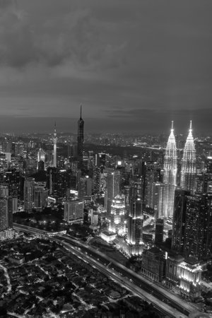 A breathtaking aerial perspective of Kuala Lumpur's cityscape, capturing the city's vibrant energy at dusk.の写真素材