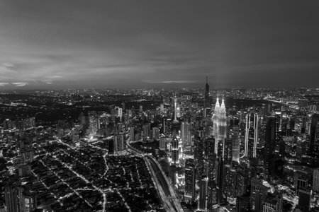 stunning aerial photo captures Kuala Lumpur at sunset, taken from a high vantage point