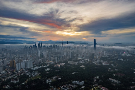 aerial view of kuala lumpur city during sunrise
