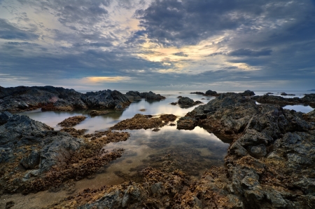 Cloudy sunrise over Pantai Pandak, terengganuの写真素材