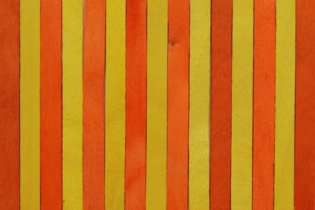 Yellow and orange wooden background.の写真素材