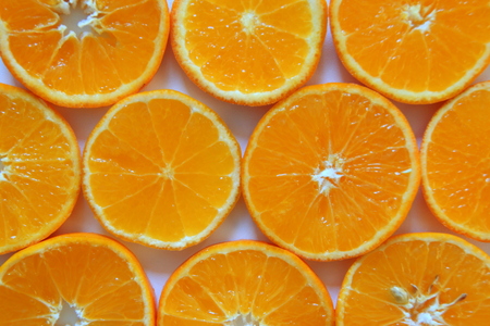 Ripe and fresh mandarins close up for background.
