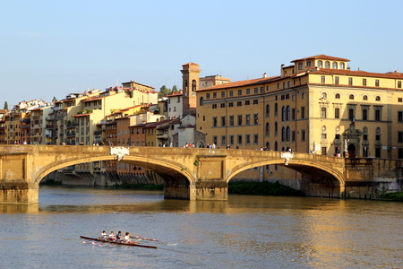 Travel to Florence, Italy. The view on the bridge, river.and buildings.の写真素材