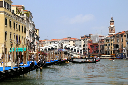 Travel to Venice, Italy. The gondolas on the venetian canal near to Ponte di Rialto.の写真素材