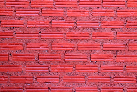 Red wall from bricks for background.の写真素材