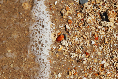 Travel to island Koh Lanta, Thailand. The seashore with stones and clear water.の写真素材