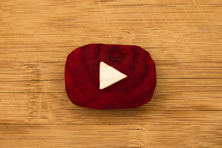 Tyumen, Russia - September 02nd, 2017: Youtube logo made from pieces of beetroot and cabbage on the...