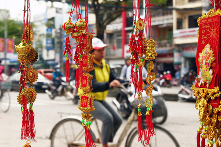 Vietnamese New Year decoration on a blurred background of a street. Hue, Vietnam.のeditorial素材