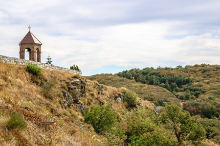 Tower of Enchantment Overlooking a Forested Hill. Udzo Monastery on Mtatsminda Mountain. Udzo...