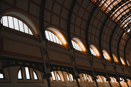 Architectural Marvel Ornate Arches and Windows of a Historic Building Interior.の写真素材