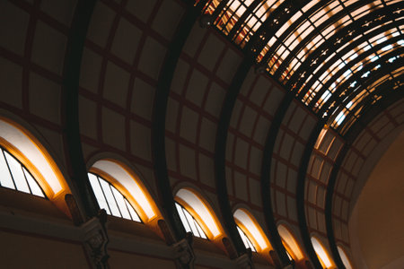 Architectural Grandeur Vaulted Ceiling with Windows in a Classic Building Interior.の写真素材