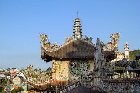 Ancient Asian Temple Architecture with Intricate Dragon Detail. Linh Phuoc Pagoda, Dalat, Vietnam.の写真素材