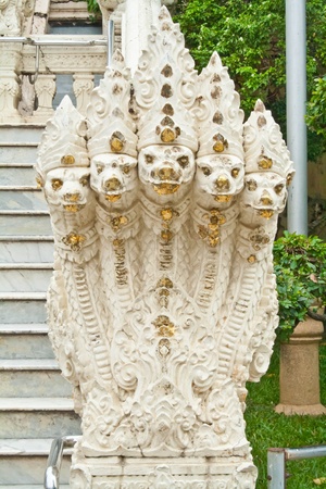 statue king of nagas in front of buddhism templeのeditorial素材