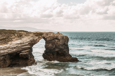 Beach of the cathedrals with large stones of Ribadeo, Lugo, Spainの写真素材