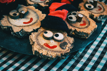 Traditional decoration of Catalonia, a happy face made on a wooden trunkの写真素材