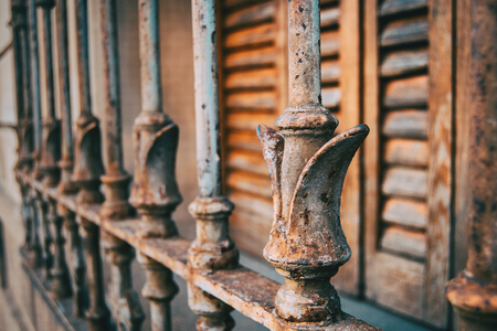 Rusty iron bars in an old windowの写真素材