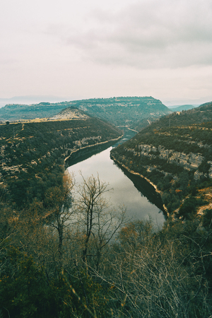 Riverbed seen from above on a cloudy winter dayの写真素材
