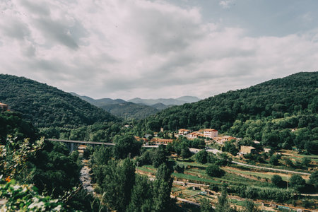 mountains of sadernes on a cloudy summer day in spainの写真素材