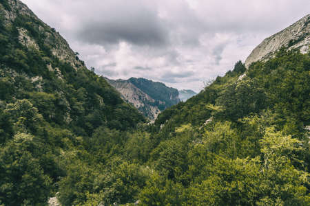 cloudy day in the mountains of the natural park of the ports, in tarragona (spain). Photograph taken from a trail of the trekking pathの写真素材