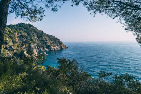 landscape of beaches and coves of the spanish costa brava on a sunny dayの写真素材