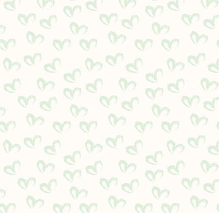 Seamless pattern of hand drawn simple hearts in pastel green color on beige and neutral backgroundの写真素材