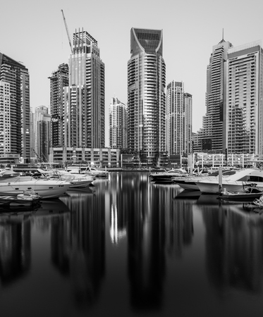 DUBAI, UAE - October 25, 2014: Modern buildings in Dubai Marina, Dubai, UAE. In the city of artificial channel length of 3 kilometers along the Persian Gulf.のeditorial素材