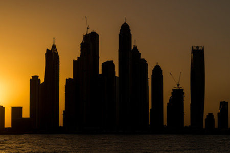 DUBAI, UAE - OCTOBER 23, 2014.Tall Dubai Marina skyscrapers as seen from Palm Jumeirah in UAE.のeditorial素材