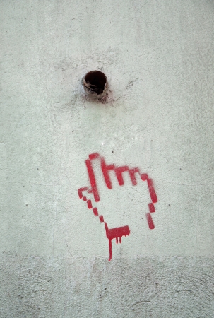 Red Spray paint of Hand on cement wallの写真素材