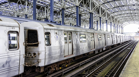 Departing subway train in the solar powered subway station at Coney Island - Brooklyn, NYのeditorial素材
