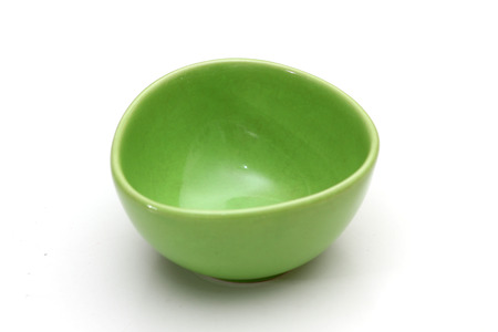 green plate on whiteの写真素材