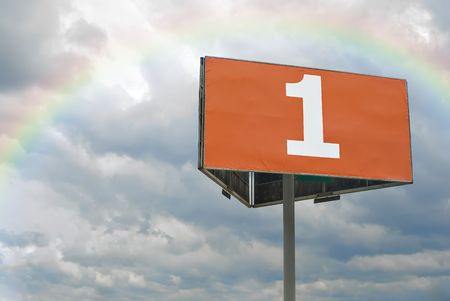 Orange billboard with big number one and lots of space. On the background there is a cloudy rainy...