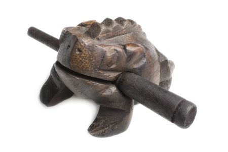 Wooden frog talisman made in Thailand. It will draw the money to its owner.の写真素材