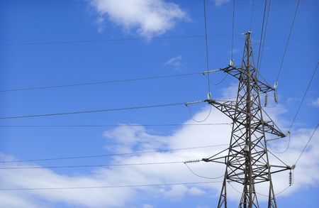 High voltage electricity pylon and the cloudy skyの写真素材