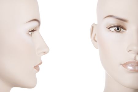 Two parts of female dummy face isolated on white backgroundの写真素材
