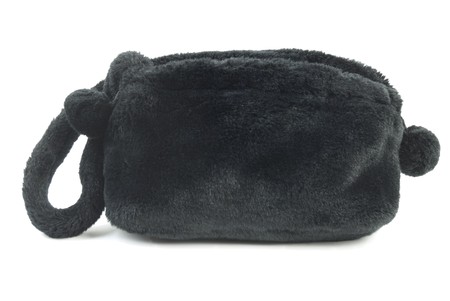 Artifical black fur handbag. Isolated on white backgroundの写真素材