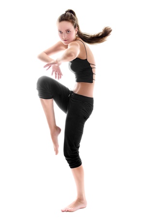 Young beauty woman is dancing. Isolated over white backgroundの写真素材