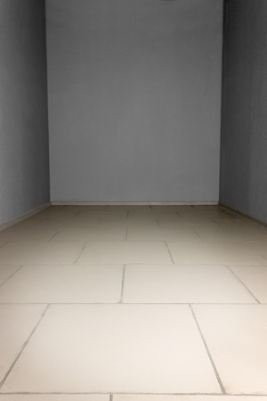 Empty room with grey and stone tiles at the floor. Backgroundの写真素材
