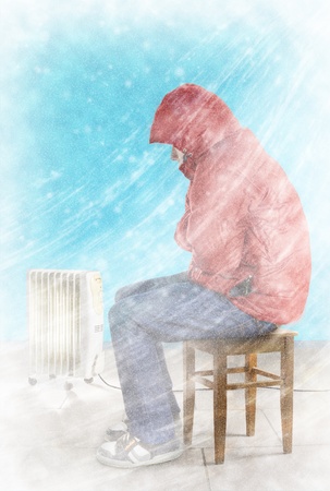 Cold winter wind with snow blows in the living room. Freezing guy in warm clothes is sitting near the heating radiator.の写真素材