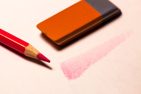 red shade on a white sheet with rubberの写真素材