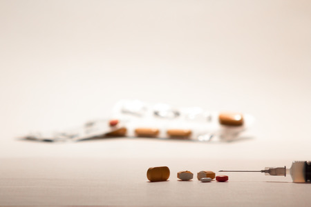 Different kind of medications, injection or pills.  But this can also be addiction drugの写真素材