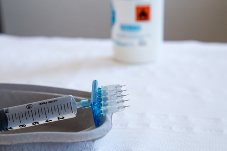 a typical syringe for mesotherapy with five micro-needles ready for use
