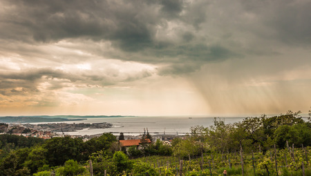 storm approaching the gulf of Trieste, Italy, in a spring dayの写真素材