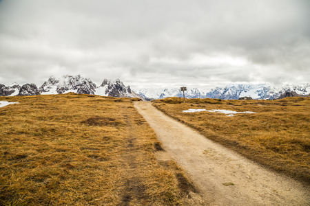 a mountain between the fog in the italian alpsの写真素材