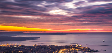 the sun goes down in the bay of Trieste, Italyの写真素材