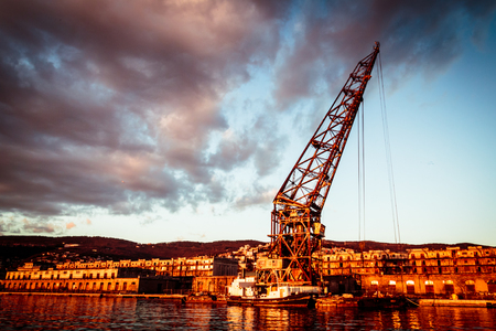 An ancient crane named "Ursus" in the port of triesteの写真素材