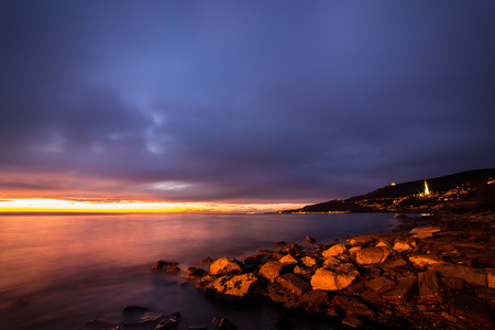 evening on the shoreline of Triesteの写真素材