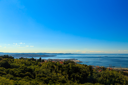sun is shining in the bay of Trieste in a sunny dayの写真素材