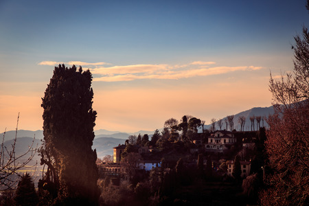 The sun goes down on the city of Bergamo, Italyの写真素材